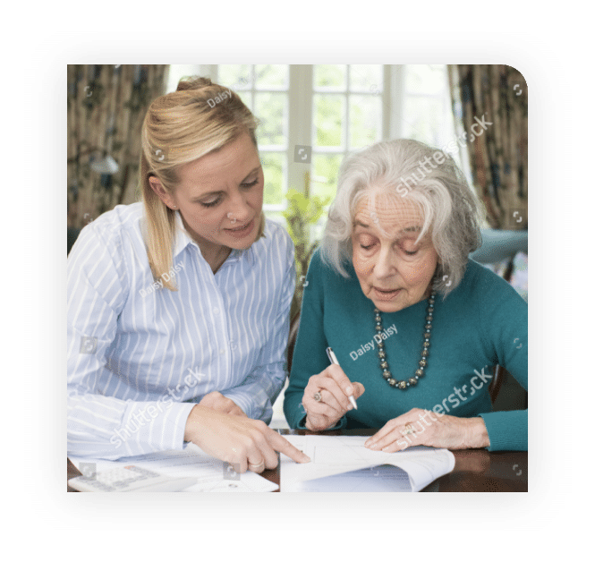 woman-helping-senior-neighbor-with-paperwork